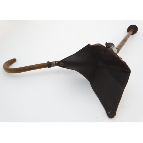 528 - Shooting stick: a mid 20thC shooting stick with triangular leather and canvas seat, the collar stamp... 