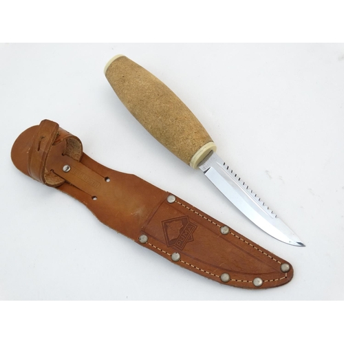 537 - A Fisherman's knife by Puma of Solingen, with 4 1/2'' cork (floating) handle, 3 1/2'' blade, in its ... 