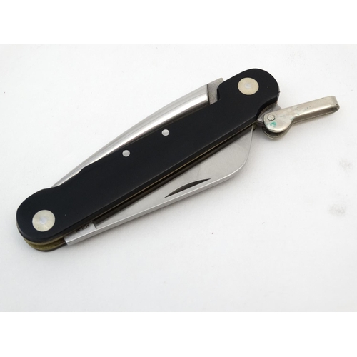 540 - A rare Cammilus pocket knife, of carbonitride titanium and Japanese steel construction, having marli... 