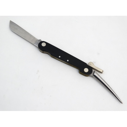 540 - A rare Cammilus pocket knife, of carbonitride titanium and Japanese steel construction, having marli... 