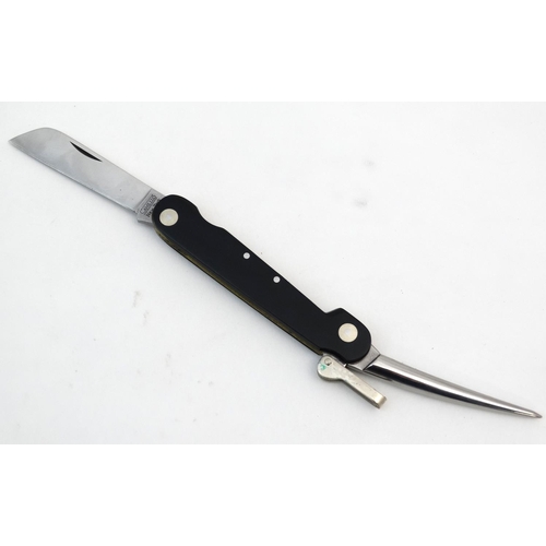 540 - A rare Cammilus pocket knife, of carbonitride titanium and Japanese steel construction, having marli... 