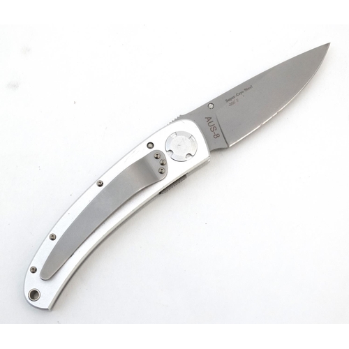 541 - A Gigand 'Spectrum LT' pocket knife (designed by Fred Carter), of hardened aluminium and super cryo ... 