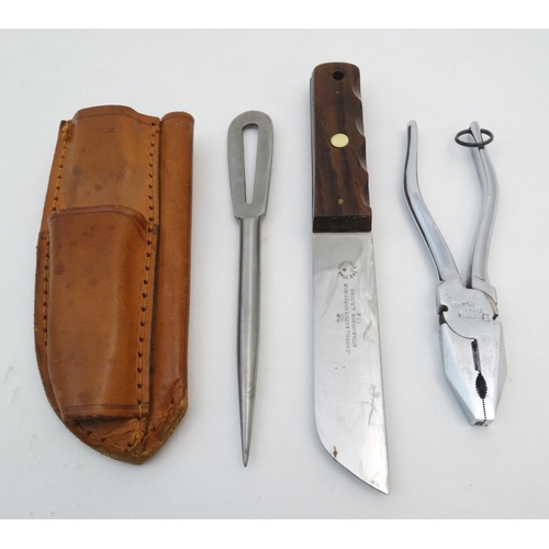 543 - A Yachtsman's three piece rigging kit , comprising knife (by J Nowill), needle and pliers, in leathe... 