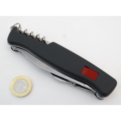 544 - A rare Wenger 'Everest ' Ranger Swiss army knife, having a range of blades and tools,  8 3/4'' exten... 