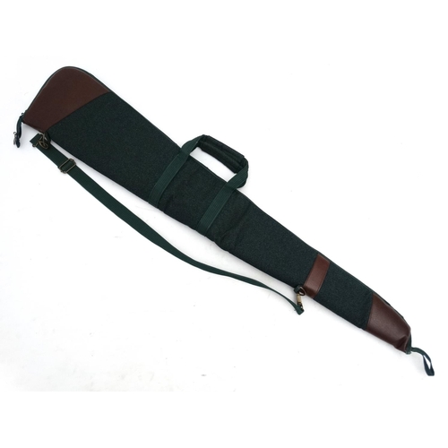 553 - Shooting: A Napier leather and synthetic reinforced gun slip, with zip opener, carry handles and str... 