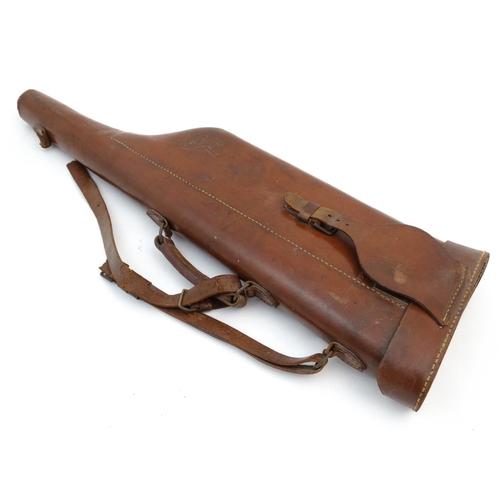 566 - Shooting: An early to mid 20thC tan leather Leg o Mutton gun case, to fit 30'' barrels (max), having... 