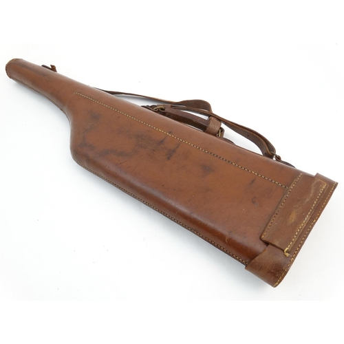 566 - Shooting: An early to mid 20thC tan leather Leg o Mutton gun case, to fit 30'' barrels (max), having... 