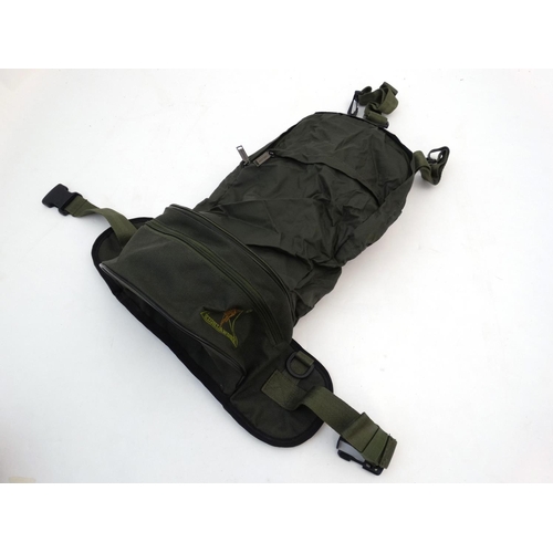 569 - Shooting / Fishing: A Highlander synthetic 'bum bag', the internal liner converting to a rucksack wi... 