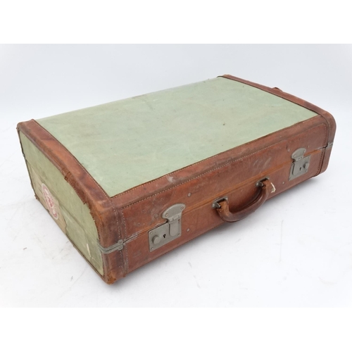 573 - A vintage leather and canvas suitcase by Victor, England, 26'' wide x 8'' tall x 17'' deep