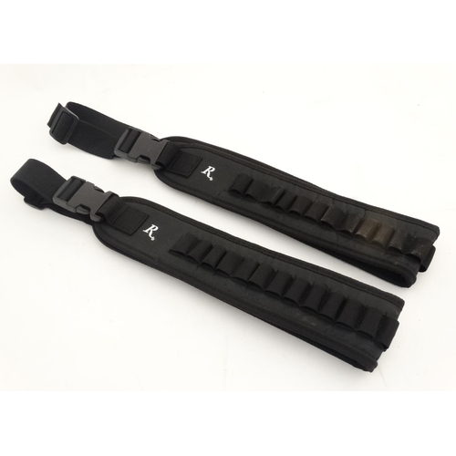 575 - Shooting  : Two Remington cartridge belts , black synthetic finish , each approximately 44'' long