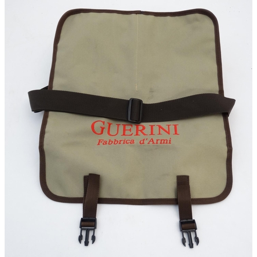 577 - Shooting: A Caesar Guerini canvas and leather range / game bag having large internal compartment wit... 