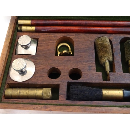 583 - Shooting: A William Powell presentation shotgun cleaning kit, of figured walnut construction, the in... 