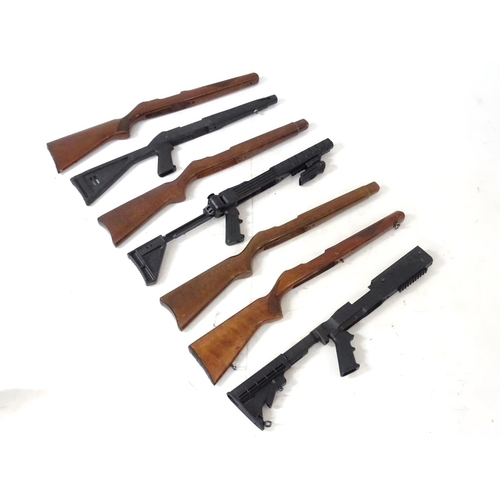 589 - Shooting: An assortment of Ruger 10/22 rifle stocks, to include both wooden and tactical / folding e... 