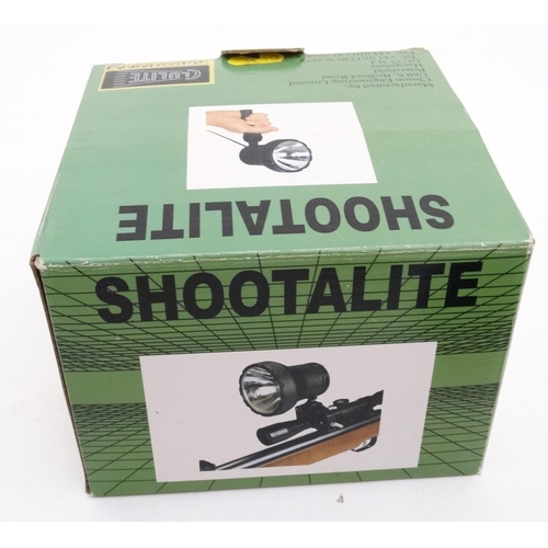 594 - Shooting : A boxed night shooting Lamp by Cluson ' Shootalite ' , having hand grip and vehicle cigar... 