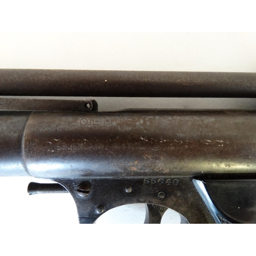 625 - Airgun: A Webley & Scott 'Mark I' .177 air pistol, having black bakelite grips, approximately 7 1/2'... 