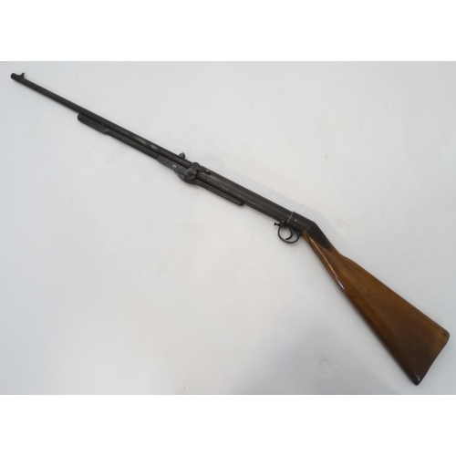 633 - Airgun: a BSA standard .22 underlever air rifle, 19 1/4'' barrel with open sights and side button co... 