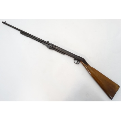 633 - Airgun: a BSA standard .22 underlever air rifle, 19 1/4'' barrel with open sights and side button co... 