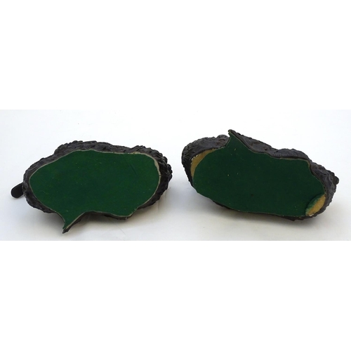 67 - A pair of highly detailed composite garden models of domestic duck, the largest 13 1/2'' long