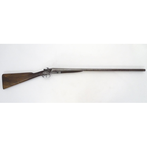 714 - Shotgun: The stock & action of a Victorian S R Jeffery 12 bore side by side hammergun, the action pr... 