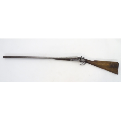 714 - Shotgun: The stock & action of a Victorian S R Jeffery 12 bore side by side hammergun, the action pr... 