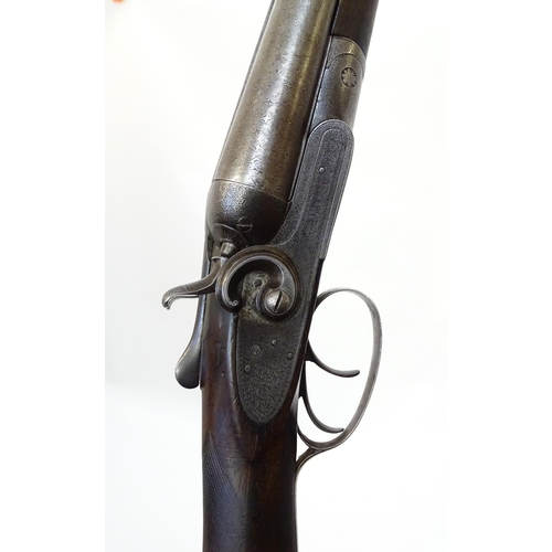 714 - Shotgun: The stock & action of a Victorian S R Jeffery 12 bore side by side hammergun, the action pr... 