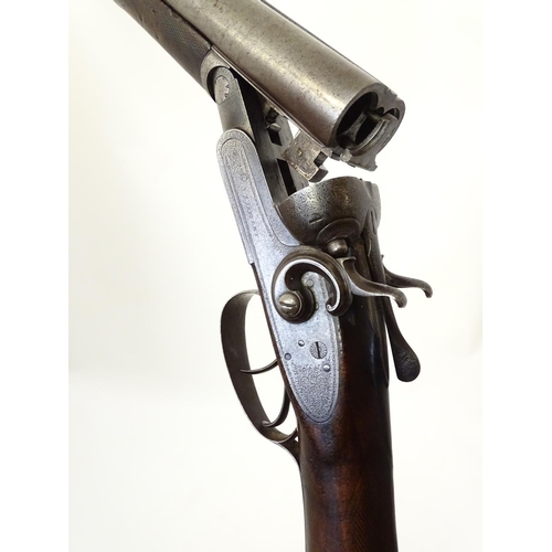 714 - Shotgun: The stock & action of a Victorian S R Jeffery 12 bore side by side hammergun, the action pr... 