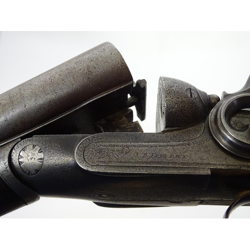 714 - Shotgun: The stock & action of a Victorian S R Jeffery 12 bore side by side hammergun, the action pr... 