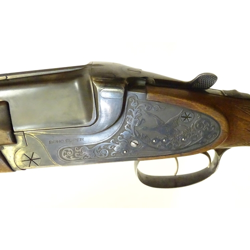 717 - Shotgun: The stock & action of a BRNO ' Super ' 12 bore over and under shotgun, the action engraved ... 