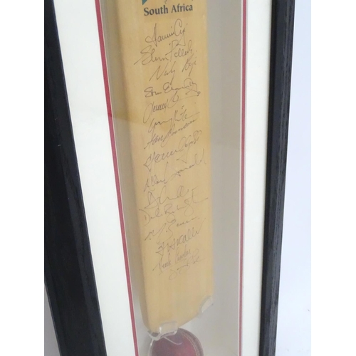 96 - A framed Gunn & Moore official autographed cricket bat of the 1999 Cricket World Cup, signed by the ... 