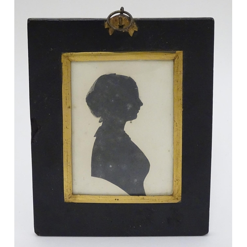 5 - Silhouette : a painted monochrome silhouette , a bust portrait looking right ,  entitled AMC Goluest... 