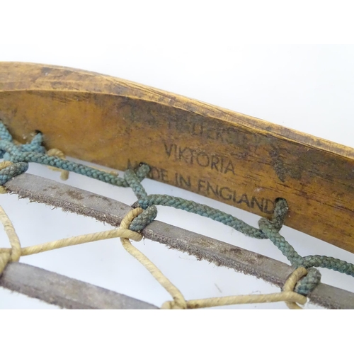 135 - Two old lacrosse rackets, marked ' T.S. Hattersley's, Viktoria, made in England ' . Approx 43'' long