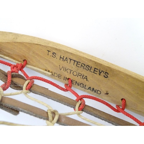 135 - Two old lacrosse rackets, marked ' T.S. Hattersley's, Viktoria, made in England ' . Approx 43'' long