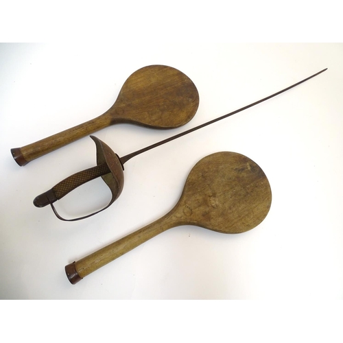 136 - A pair of late 19thC  wooden battledores by F.H. Ayres Ltd , together with an early 20thC basket hil... 