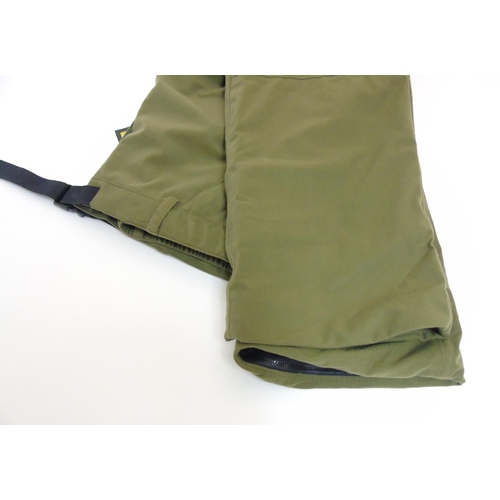 188 - A pair of olive green Ridgeline of New Zealand trousers, size 3 XL (New with tags)