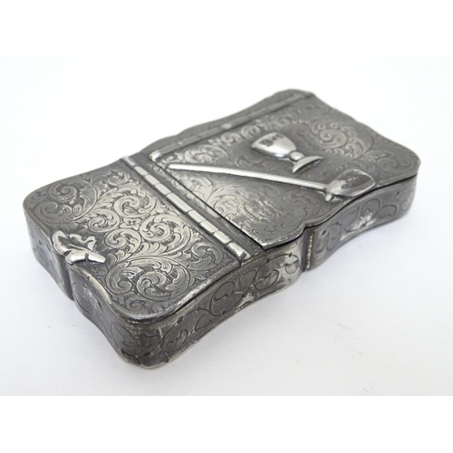 203 - A white metal 2-sectional snuff / tobacco box with acanthus scroll decoration, image of cup and pipe... 