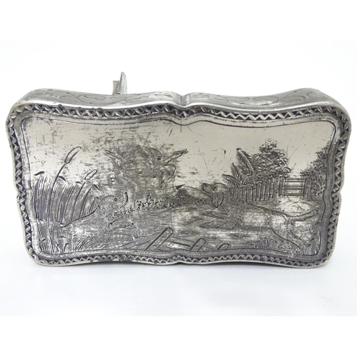 203 - A white metal 2-sectional snuff / tobacco box with acanthus scroll decoration, image of cup and pipe... 