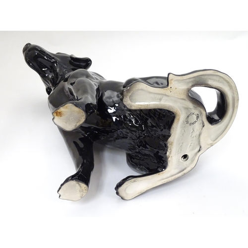 238 - A Beswick figure of a large fireside black Labrador dog no. 2314, makers mark impressed to base, 13'... 