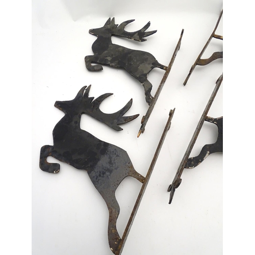 247 - A set of 4 cast iron and black painted stag formed wall brackets. Approx 18'' high x 14'' deep / pro... 