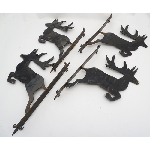 247 - A set of 4 cast iron and black painted stag formed wall brackets. Approx 18'' high x 14'' deep / pro... 