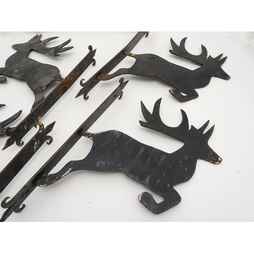 247 - A set of 4 cast iron and black painted stag formed wall brackets. Approx 18'' high x 14'' deep / pro... 