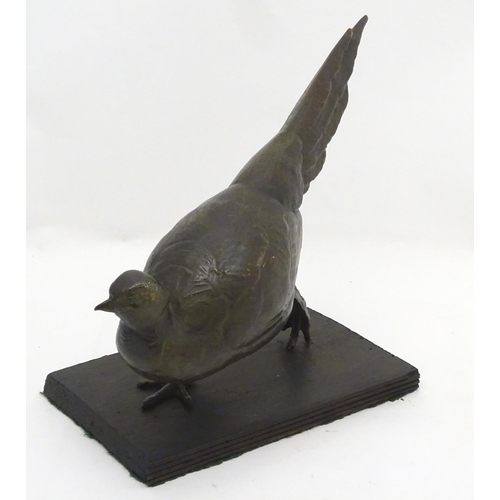 248A - A late 19th/ early 20thC patinated bronze model of a pheasant. Approx 18'' long x 11'' high