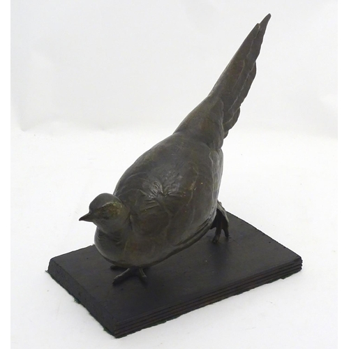 248A - A late 19th/ early 20thC patinated bronze model of a pheasant. Approx 18'' long x 11'' high