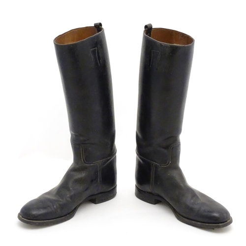 295 - A pair of black leather gentleman's riding boots. Approx size 11/12, 18'' high overall