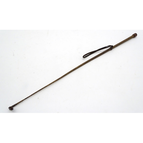 298 - An old riding crop. Approx 24'' long