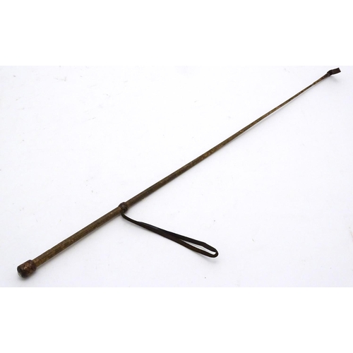 298 - An old riding crop. Approx 24'' long