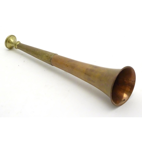 304 - A copper and brass short hunting horn approx 8 3/4'' long