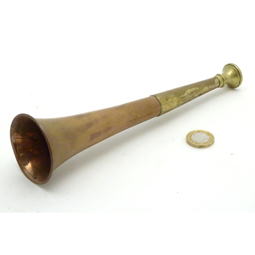 304 - A copper and brass short hunting horn approx 8 3/4'' long