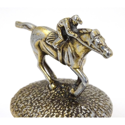 319 - Horse Racing Interest : A late 20thC / 21stC cork and silver plate bottle stopper with image of race... 