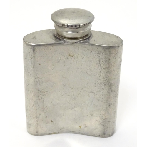 320 - A small hip flask with screw top 2 3/4'' high