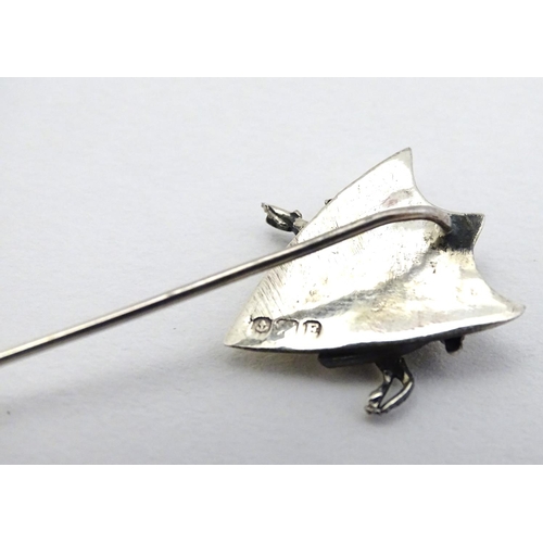 328 - Equine / Hunting Interest : A stick pin surmounted by silver shield with horseshoe decoration and ru... 